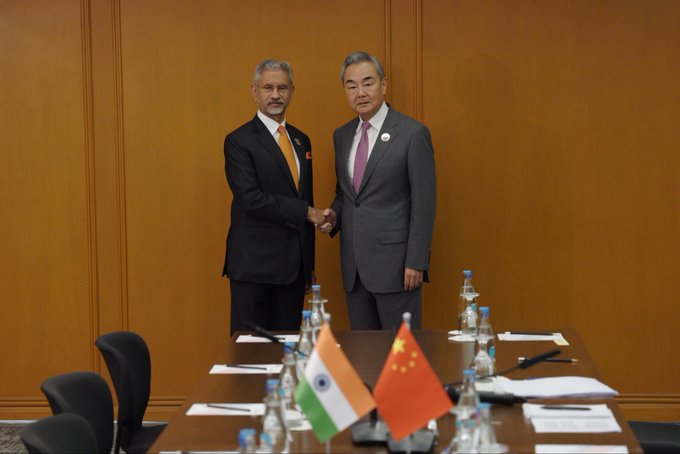 Jaishankar Meets Wang Yi In Manila: Border Peace And Trade Balance Lead India-China Talks Senior diplomats holding bilateral talks during an international conference.