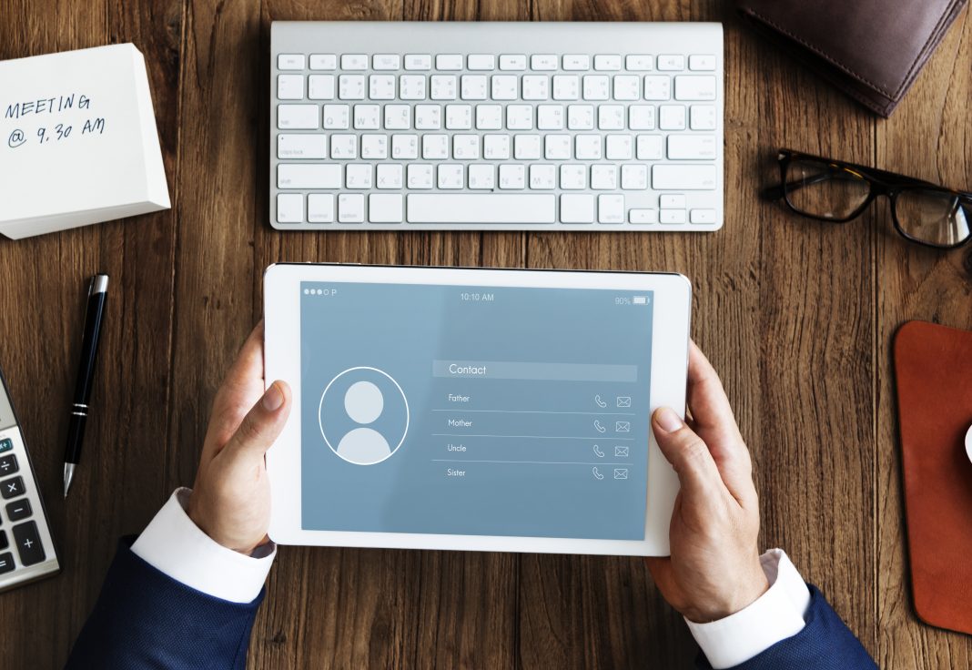 5 Google Account Settings You Should Change Today For Better Privacy Person reviewing Google Account privacy and security settings on a laptop
