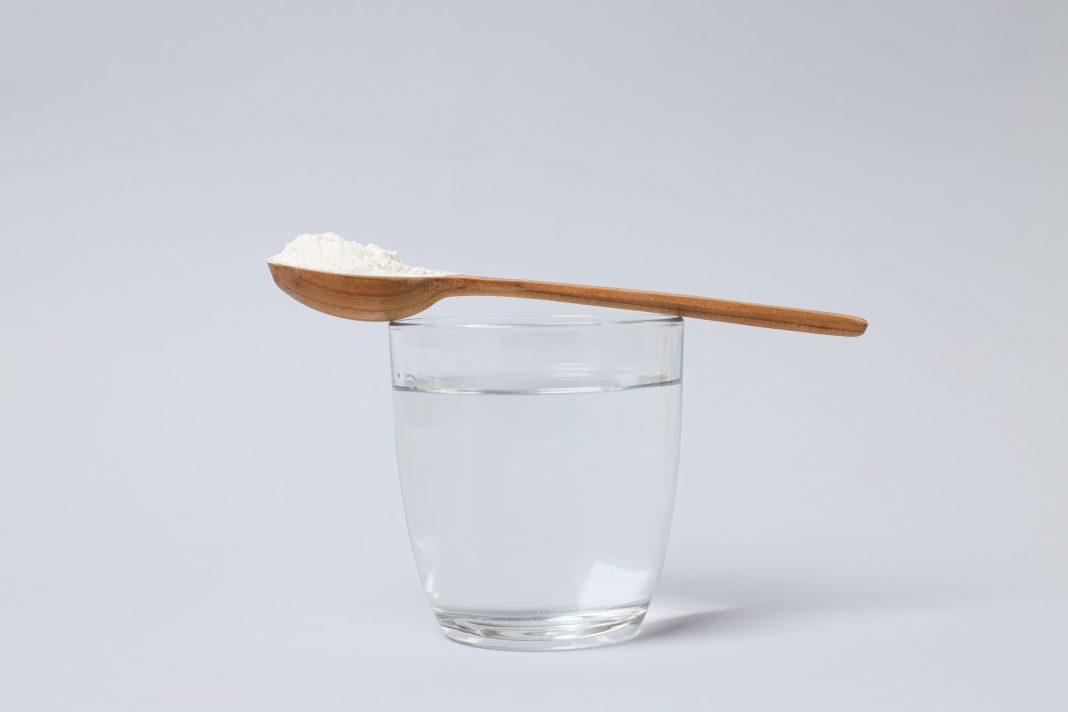Water With Sea Salt In The Morning? What Doctors Say About The Viral Longevity Habit Glass of water with sea salt placed on a table as part of a morning hydration routine