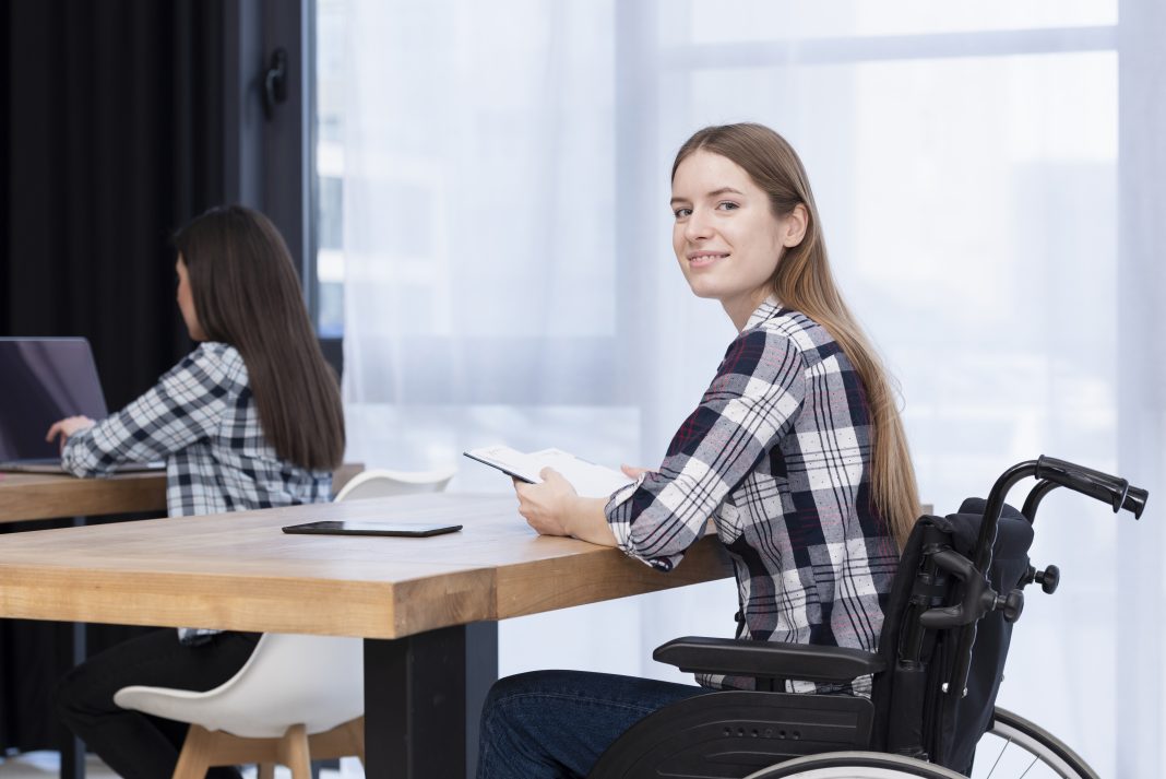 Student With A Disability Joining College? Check The UGC’s New Classroom, Exam, and Campus Support Guidelines Student with a disability accessing an inclusive college campus under UGC accessibility guidelines.
